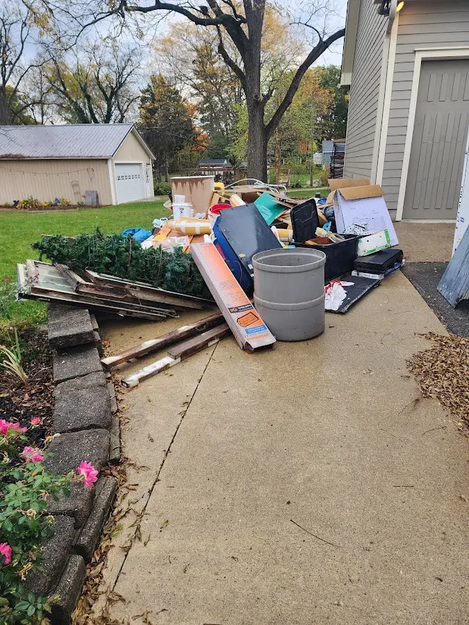 Dumpster being loaded with debris for Commercial Dumpster Rental in New York